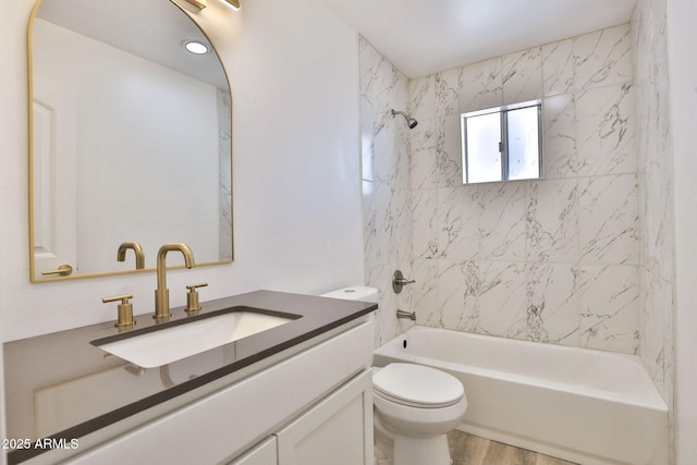 5510 E Dallas St, Mesa, AZ 85205 - full bathroom featuring vanity, shower / bathtub combination, toilet, and wood finished floors