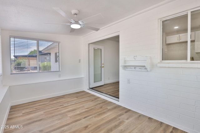 5510 E Dallas St, Mesa, AZ 85205 - spare room with light wood-type flooring, baseboards, and ceiling fan