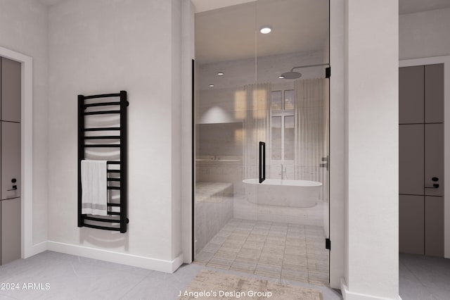 bathroom featuring tile patterned flooring, shower with separate bathtub, and radiator