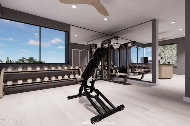 gym with wood-type flooring and ceiling fan