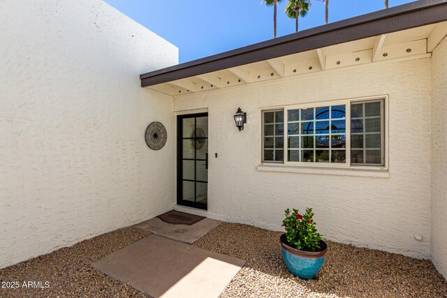 5211 E Winchcomb Dr, Scottsdale, AZ 85254 - doorway to property with stucco siding
