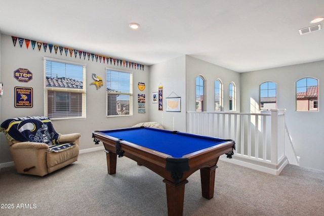 rec room with plenty of natural light, pool table, and light colored carpet