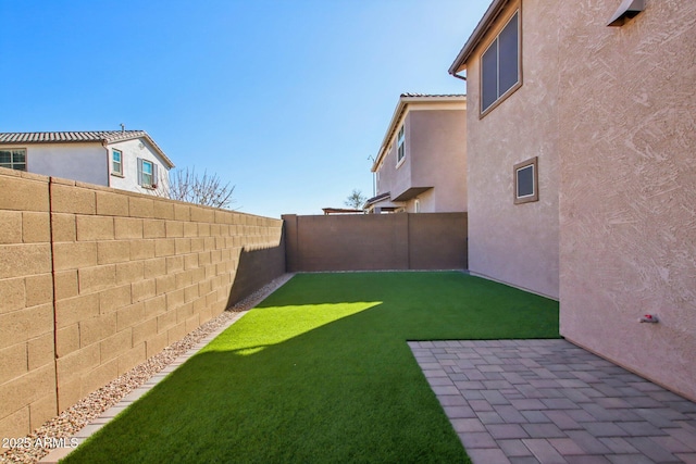 view of yard with a patio area