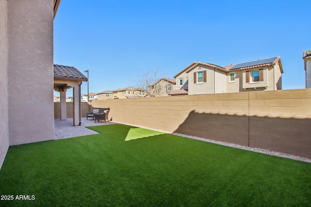 view of yard with a patio area