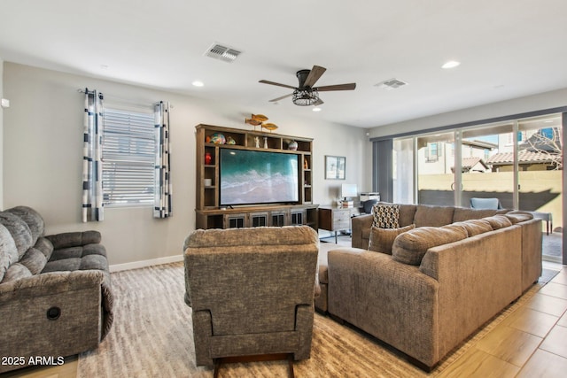 living room featuring ceiling fan