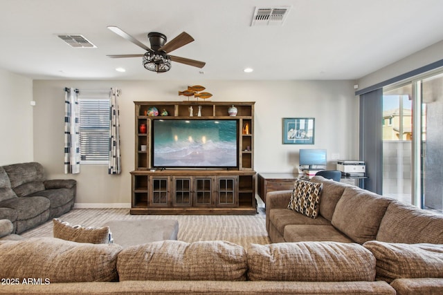 living room with ceiling fan