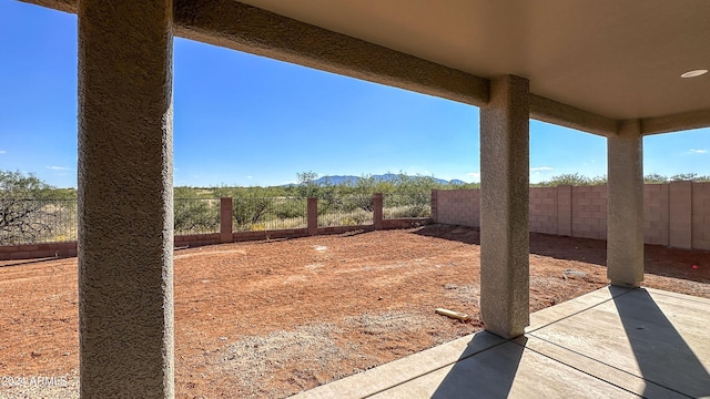 view of yard with a patio and a fenced backyard