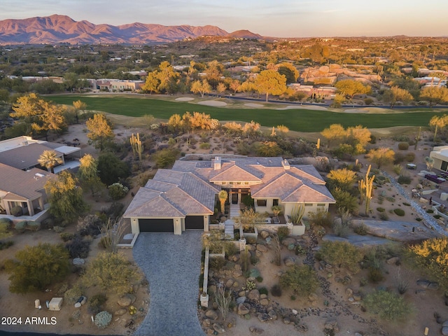 aerial view at dusk with a mountain view