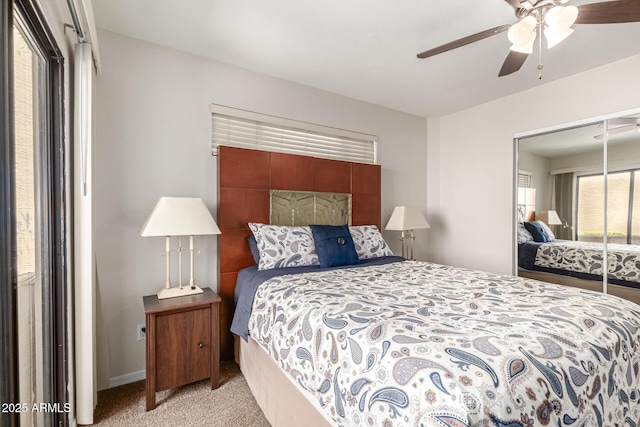 2228 N 52nd St Unit 140, Phoenix, AZ 85008 - bedroom featuring light carpet, a ceiling fan, and a closet