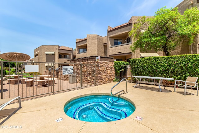 2228 N 52nd St Unit 140, Phoenix, AZ 85008 - view of swimming pool with a community hot tub and a patio