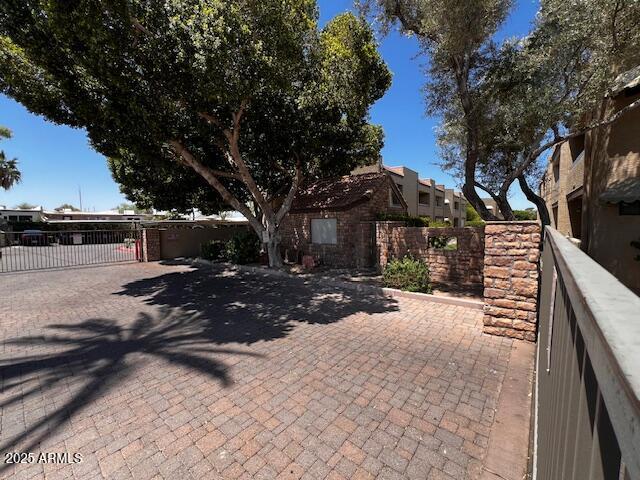 2228 N 52nd St Unit 140, Phoenix, AZ 85008 - view of front of house featuring a gate
