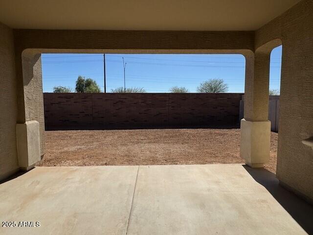 view of patio with fence