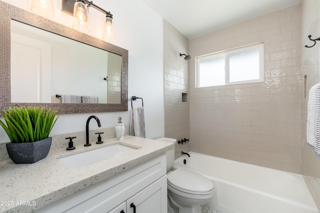full bath featuring bathtub / shower combination, toilet, and vanity
