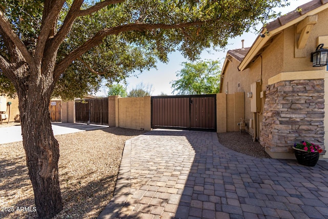 exterior space with a gate and fence