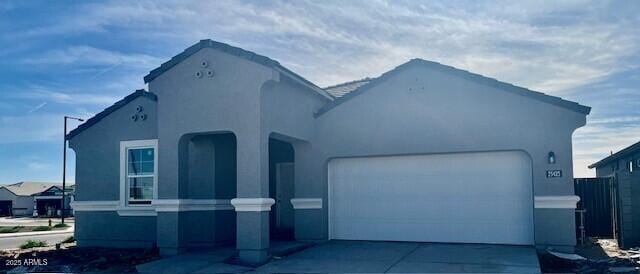 view of front of property featuring a garage