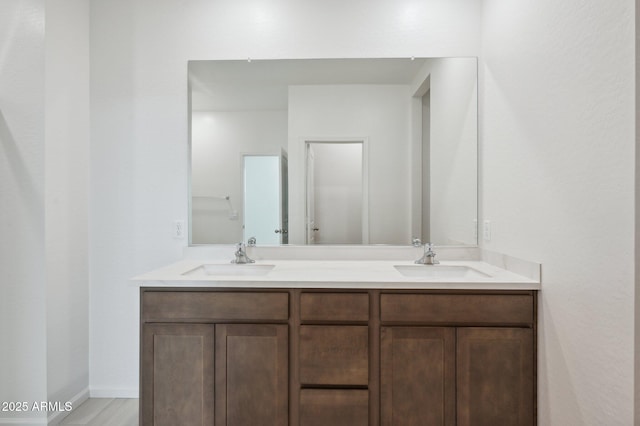 25425 W Graham Trl, Buckeye, AZ 85326 - bathroom featuring double vanity and a sink