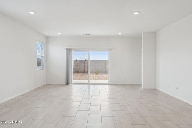 25425 W Graham Trl, Buckeye, AZ 85326 - unfurnished room featuring visible vents, baseboards, recessed lighting, and a healthy amount of sunlight