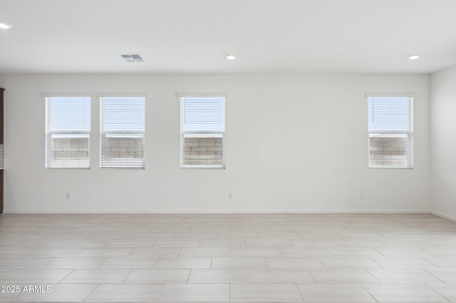 25425 W Graham Trl, Buckeye, AZ 85326 - spare room featuring visible vents, recessed lighting, and plenty of natural light