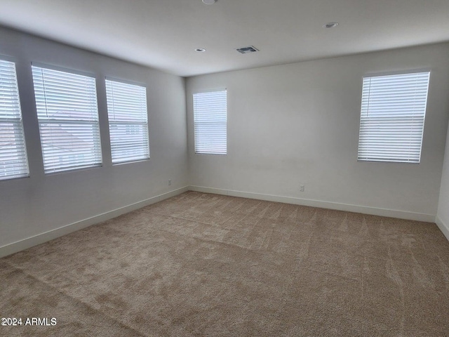 view of carpeted spare room