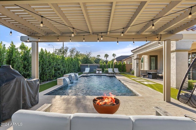 view of pool with a patio, a pergola, pool water feature, and an outdoor hangout area