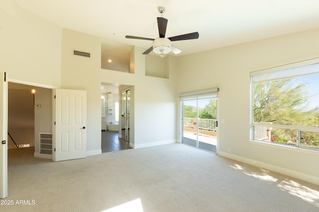 9571 E Nittany Dr, Scottsdale, AZ 85255 - unfurnished bedroom with carpet, access to exterior, a towering ceiling, a ceiling fan, and ensuite bathroom