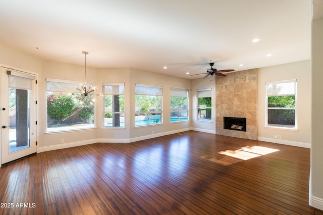 9571 E Nittany Dr, Scottsdale, AZ 85255 - unfurnished living room featuring healthy amount of natural light, recessed lighting, ceiling fan, and hardwood / wood-style floors