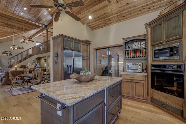 kitchen with a toaster, wood ceiling, light wood-style flooring, appliances with stainless steel finishes, and high vaulted ceiling