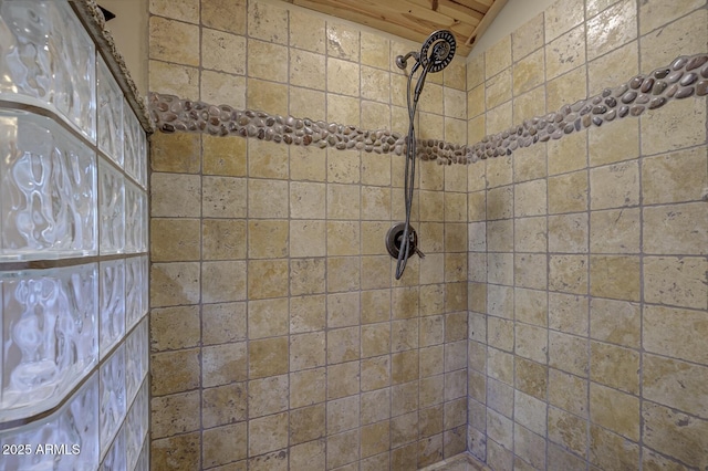 full bathroom with tiled shower