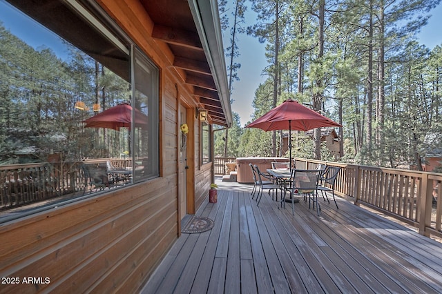 wooden deck with outdoor dining area