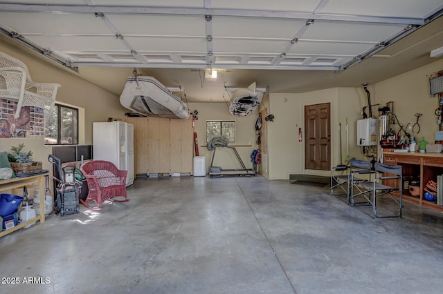 garage featuring water heater