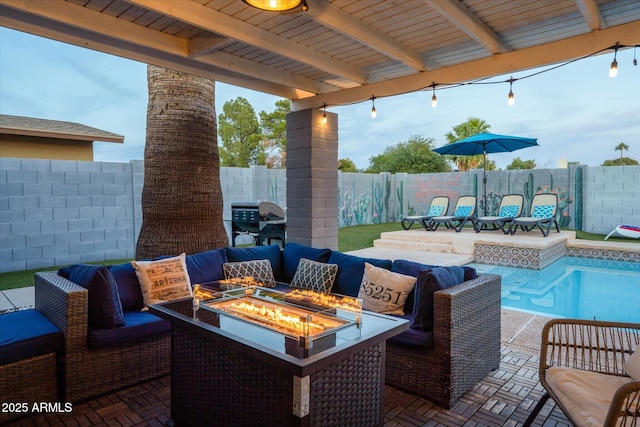 view of patio with a fenced in pool, grilling area, and an outdoor living space with a fire pit