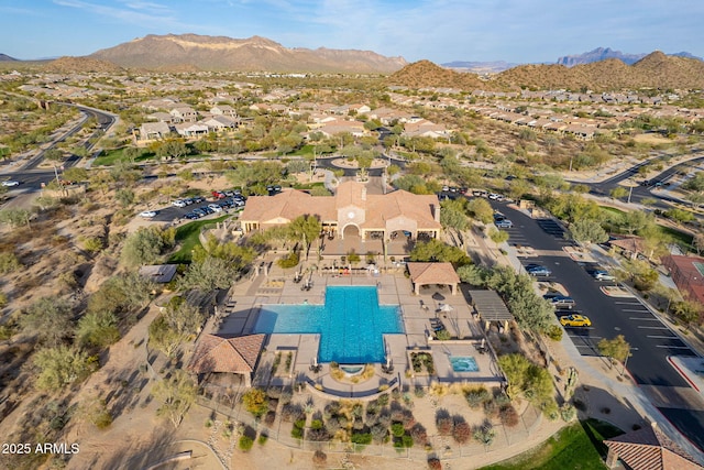 drone / aerial view featuring a residential view and a mountain view