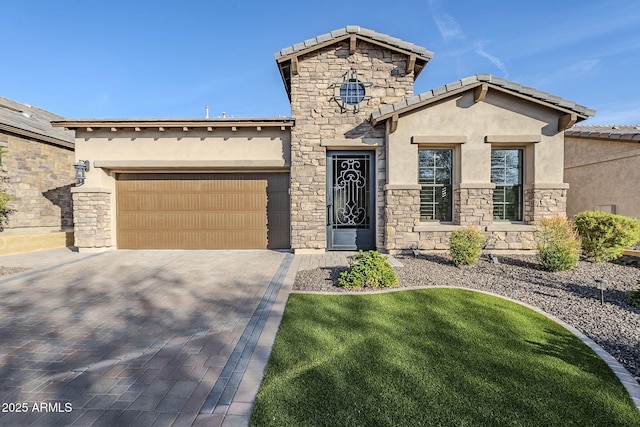 view of front facade featuring an attached garage, stone siding, a tiled roof, decorative driveway, and stucco siding