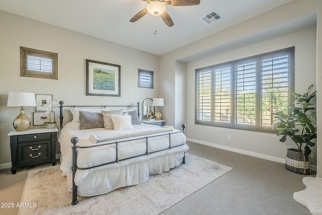 bedroom featuring carpet, visible vents, ceiling fan, and baseboards