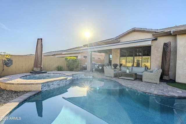 view of swimming pool featuring an outdoor hangout area, a patio, a fenced backyard, and a pool with connected hot tub