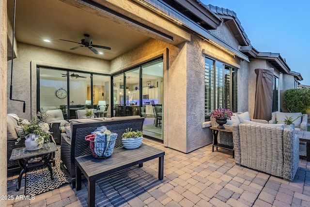 view of patio / terrace featuring ceiling fan and an outdoor hangout area