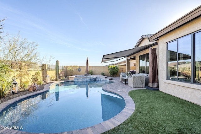 view of pool with a patio, a fenced backyard, and a pool with connected hot tub