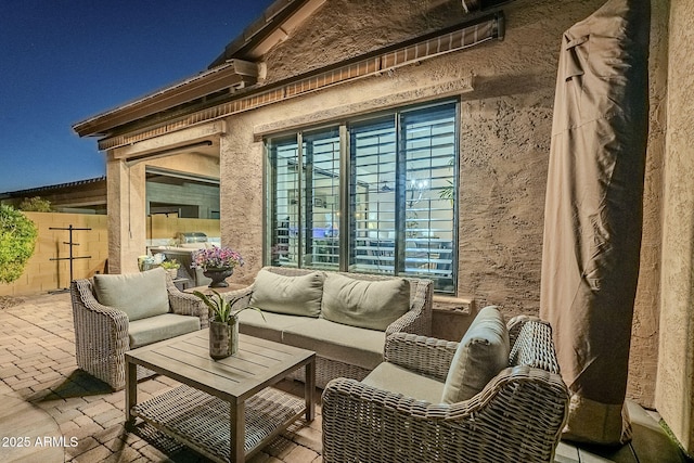 exterior space with fence and an outdoor living space