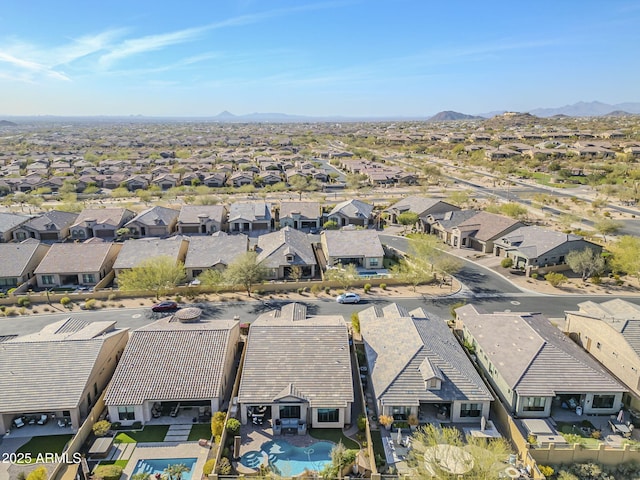 bird's eye view with a residential view and a mountain view