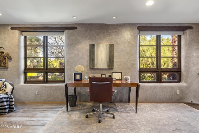 office featuring recessed lighting, baseboards, and wood finished floors