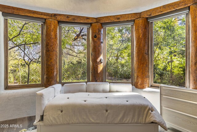 bedroom featuring wood finished floors