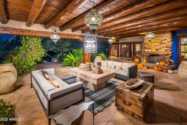 view of patio featuring an outdoor living space with a fireplace