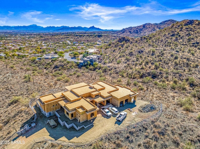 bird's eye view with a mountain view