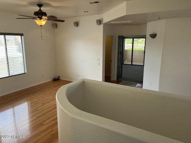 9070 E Gary Rd Unit 152, Scottsdale, AZ 85260 - empty room with wood finished floors and a ceiling fan