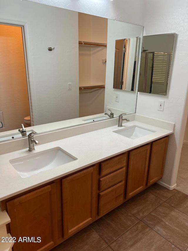 9070 E Gary Rd Unit 152, Scottsdale, AZ 85260 - bathroom featuring double vanity and tile patterned floors