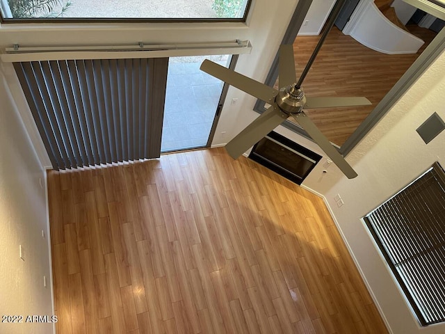 9070 E Gary Rd Unit 152, Scottsdale, AZ 85260 - unfurnished living room featuring ceiling fan and wood finished floors