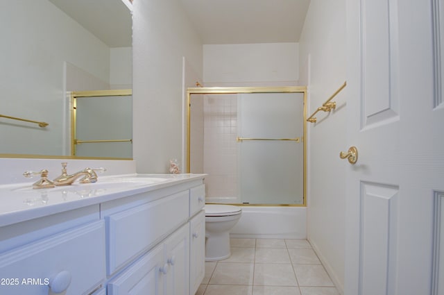 full bathroom featuring tile patterned flooring, vanity, shower / bath combination with glass door, and toilet