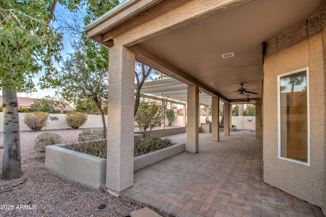 view of patio with ceiling fan