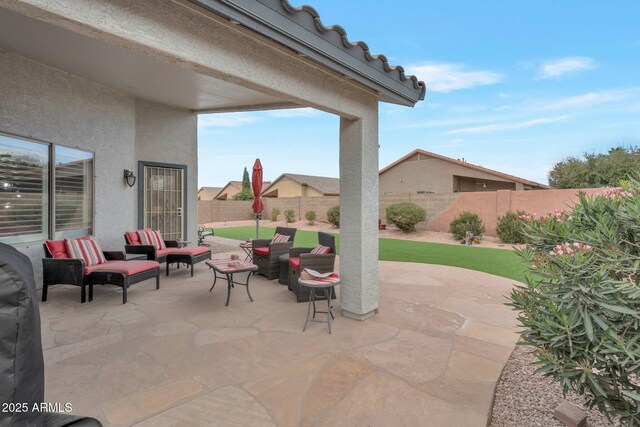 view of patio with a fenced backyard