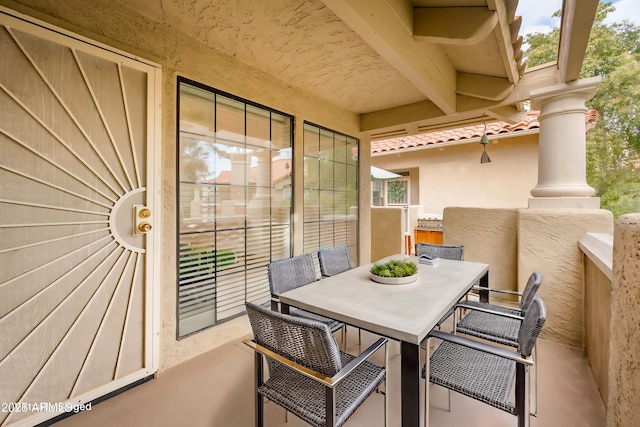 view of patio / terrace with a balcony